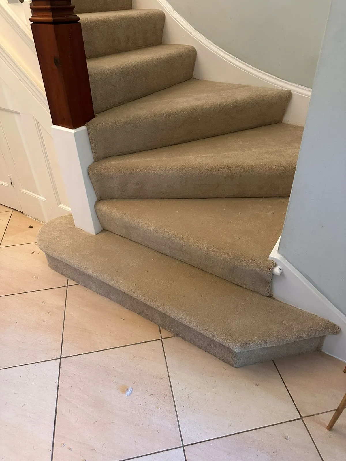 Abingdon Captivation carpet fitted on winder stairs with a curved bottom step above a tiled hall floor, Shirley, Croydon CR0